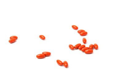 Beyaz arka planda Koenzim Q10. Yaşlanmayı önlemek için. İlaçlar ve ilaçlar.