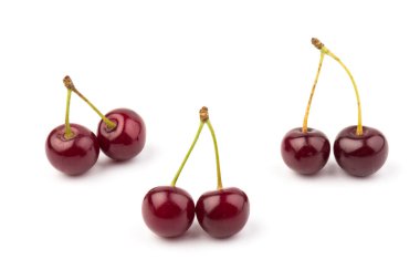 Beyaz arka planda izole edilmiş kirazlar. Kiraz arkaplan. Kirazlar düz dizayn.