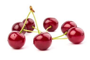 Beyaz arka planda izole edilmiş kirazlar. Kiraz arkaplan. Kirazlar düz dizayn.