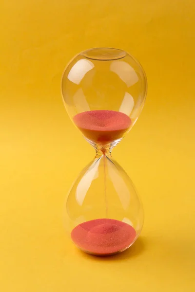 Warm mode of hourglass as time passing concept. Life time passing. Meaning of life