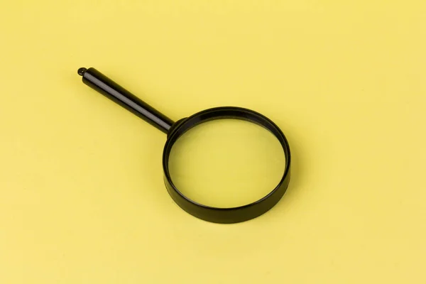 Close Magnifying Glass Yellow Background Science Research Concept Copy Space — Stock Photo, Image