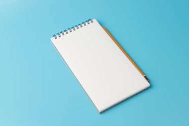 Mavi arkaplanda açık spiral boş defterin üst görünümü 