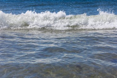 Kumsalda köpük salla. Geçmişe odaklan. Tatil kavramı.