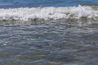 Kumsalda köpük salla. Geçmişe odaklan. Tatil kavramı.