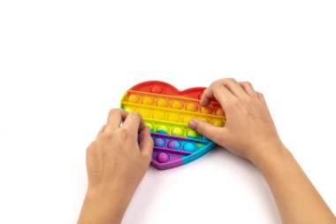 Silikon renkli anti-stres oyuncağı. Patlayan baloncuğa bas. Basit gamzeli oyuncak, kapat..