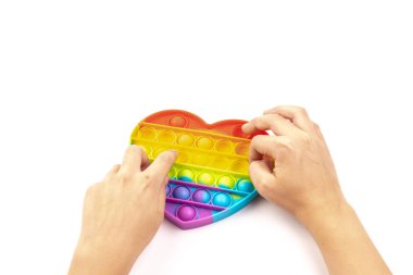Silikon renkli anti-stres oyuncağı. Patlayan baloncuğa bas. Basit gamzeli oyuncak, kapat..