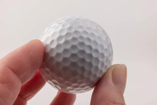 Close Hand Holding Golf Ball White Background Royalty Free Stock Photos