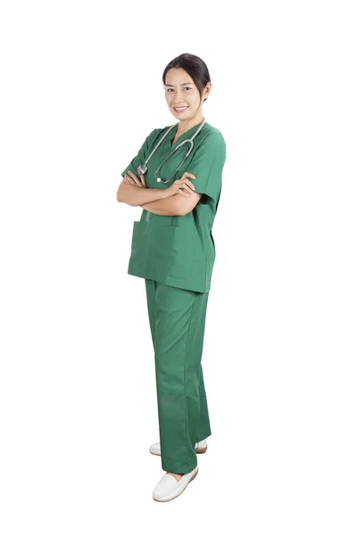 Güzel kadın doktor beyaz backgrou kabul edilen bir gülümseme ile — Stok fotoğraf