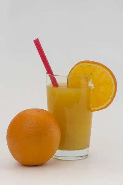 오렌지와 주스와 튜브 세그먼트 — 스톡 사진