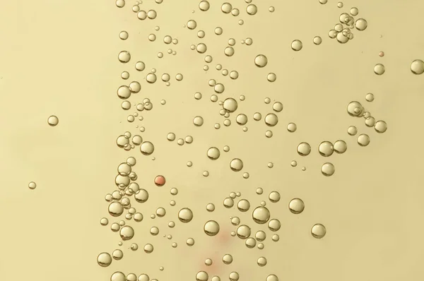 Bolhas douradas de fizz — Fotografia de Stock