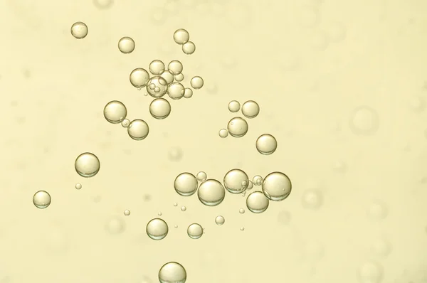 Burbujas de aire dorado —  Fotos de Stock