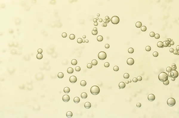 Golden fizz bubbles — Stock Photo, Image