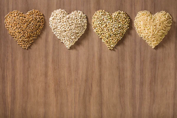 Healthy whole grains shaped like hearts