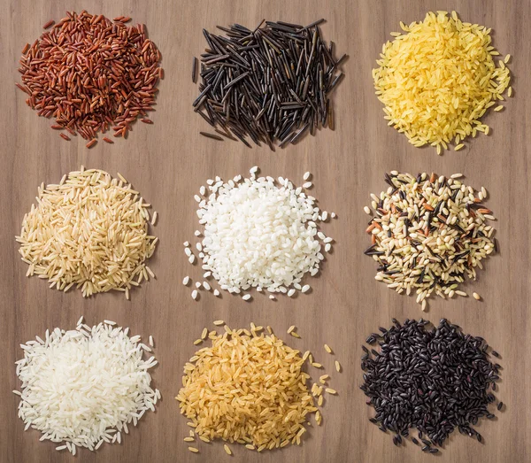 Piles of different rice varieties — Stock Photo, Image