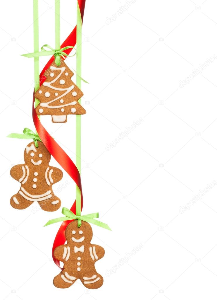 Gingerbread cookies hanging with red and green ribbon