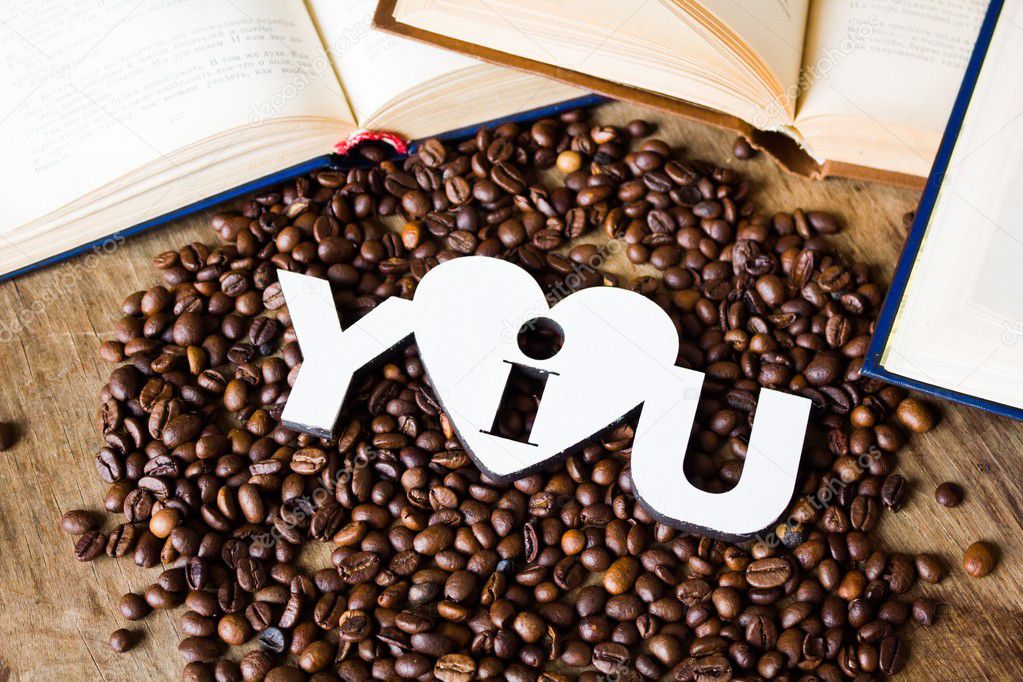 Coffee beans and book with heart on it