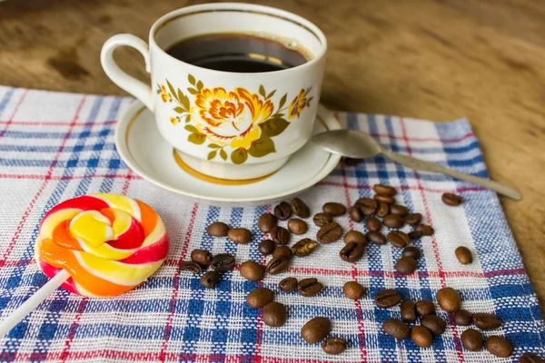 Vintage cup of black coffee — Stock Photo, Image