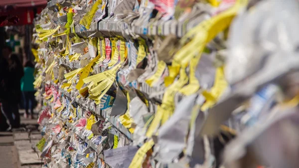 Close-up of torn adverts on wall — Stock Photo, Image