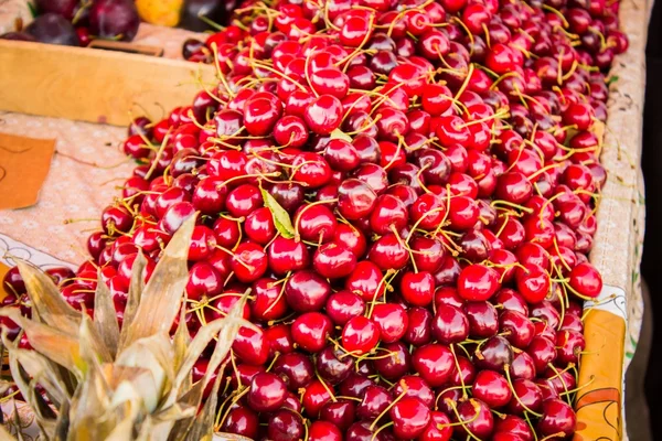 Sweet cherries at the counter — Stock Photo, Image