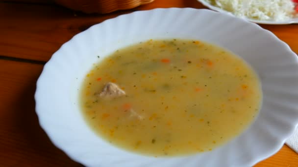 Chorba national Montenegrin soup on the table in the dining room — Stock Footage Chorba national Montenegrin soup on the table in the dining room Video Clip