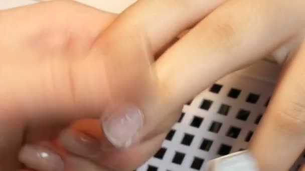 Special manicure tools polish and trim cuticles on nails at home close up view — Stock Video