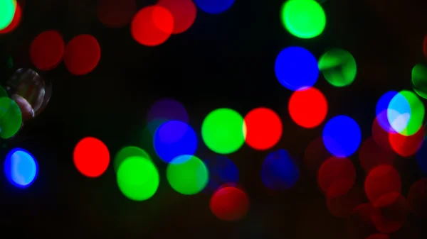 Noël fond brillant avec des lumières colorées — Photo