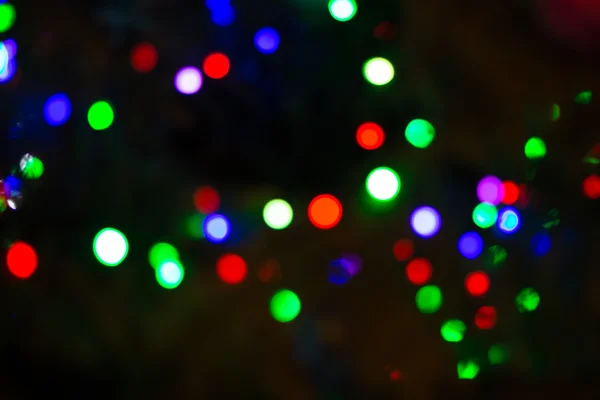 Noël fond brillant avec des lumières colorées — Photo