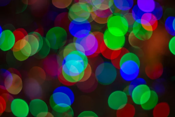 Natal fundo brilhante com luzes coloridas — Fotografia de Stock