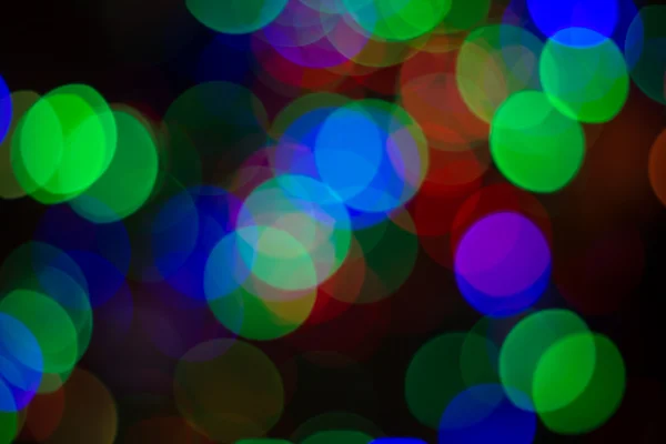 Vánoční lesklé pozadí s barevnými světly — Stock fotografie