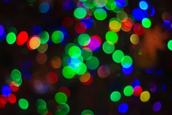 Boże Narodzenie błyszczący tło z kolorowymi światłami — Zdjęcie stockowe