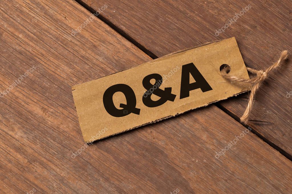 Memo note written with text Q&A stands for question and answer.