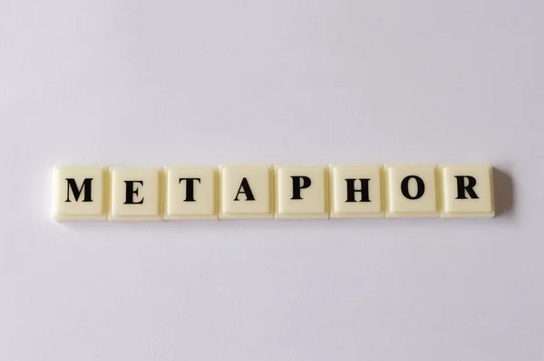 Квадратные Буквы Текстом Metaphor Изолированы Белом Фоне — стоковое фото