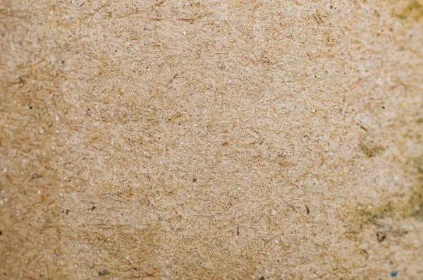 Parçacık Tahtası Yüzeyinin Kapanışı Sıkıştırılmış Ahşap İplikleri ve Çok Renkli Noktaları Gösteriyor