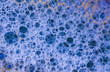 Mavi Sabun köpüklerinin ve köpüklerin makro dokusu