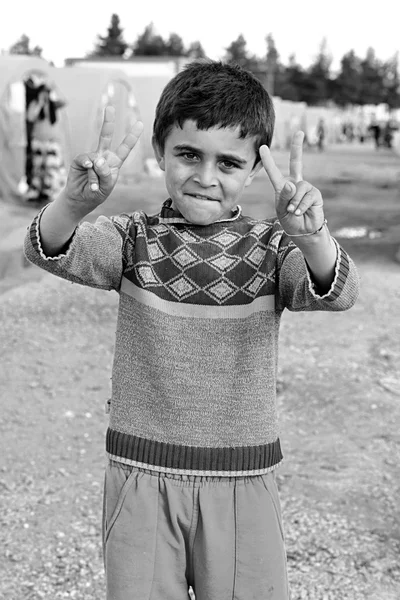 Pessoas no campo de refugiados — Fotografia de Stock