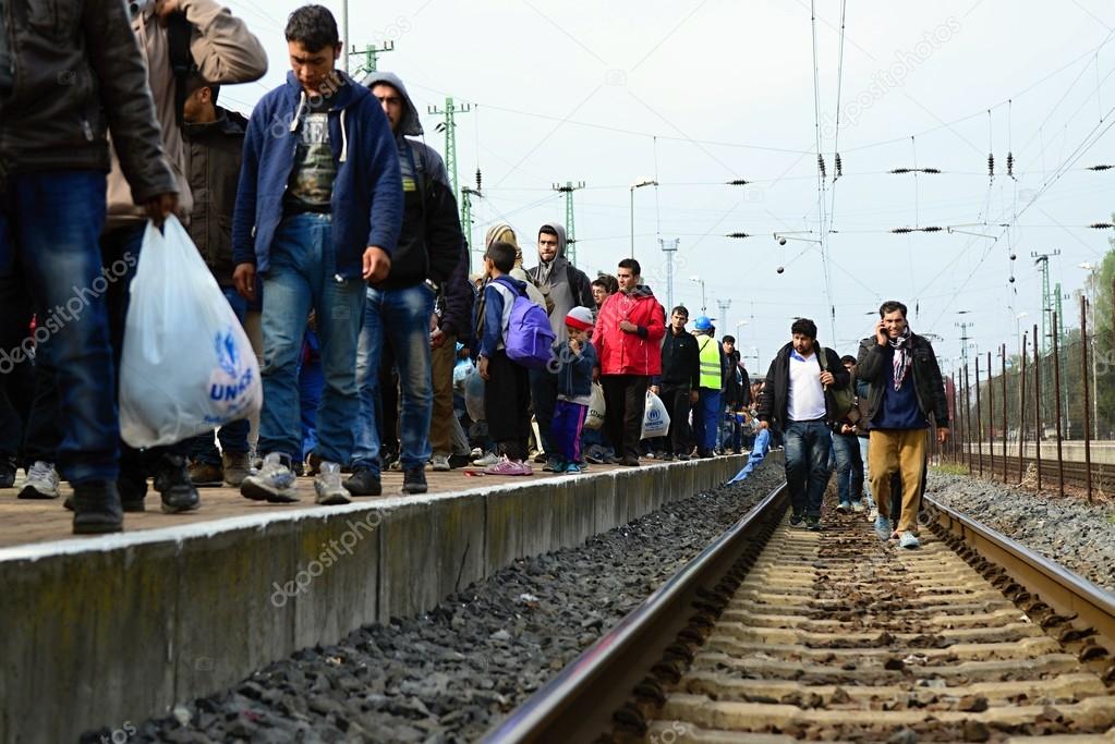 Refugees leaving Hungary Stock Editorial Photo © radekprocyk 86068092