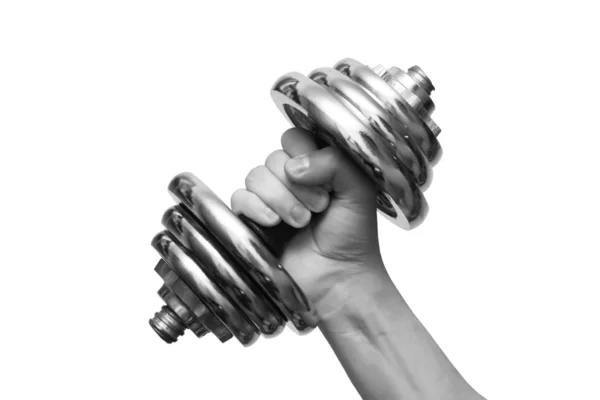 Black and white dumbbells in hand on a white background — Stock Photo, Image