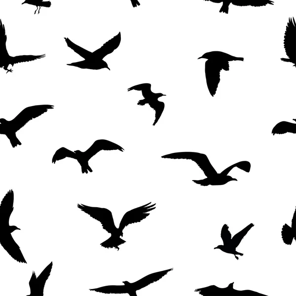 Бесшовный рисунок силуэтов летающих птиц на белом фоне. Векторная иллюстрация — стоковый вектор