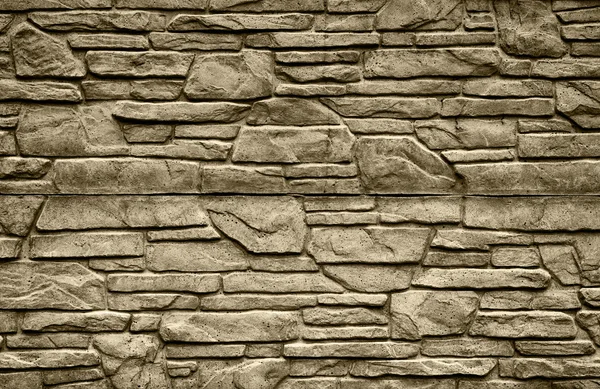 Pietra sabbiosa muro di mattoni dettagliato contrasto texture sfondo — Foto Stock