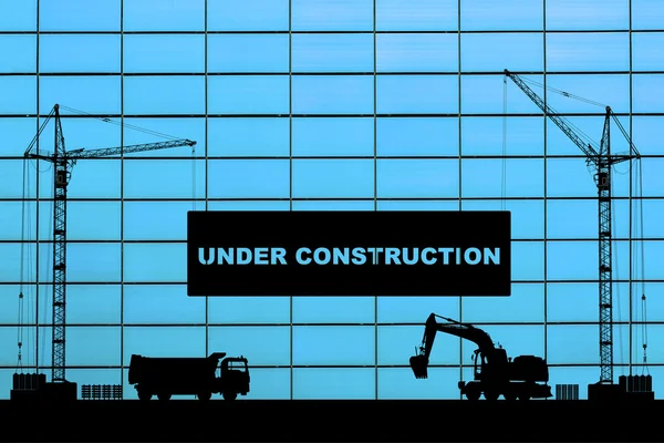 "Under construction" concept at building site with detailed silhouettes of construction machines on blue tiles background — Stock Photo, Image