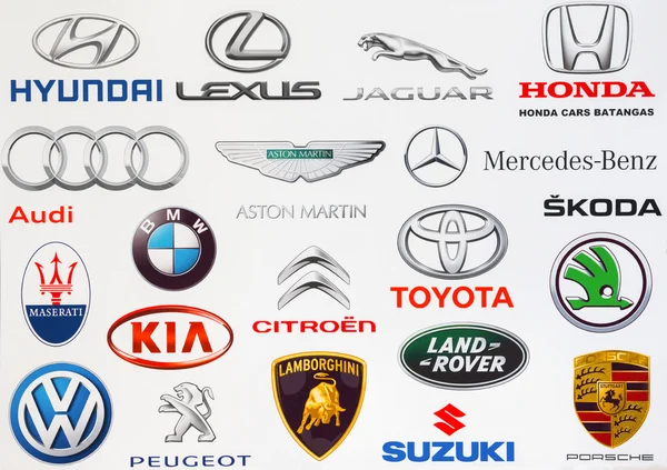 Kiev, Ukraine - September 3, 2016: Collection of popular car logos printed on white paper: Hyundai, Lexus, Honda, Jaguar, Volkswagen, Audi, Lamborghini, Skoda, Porsche, KIA, Audi, BMW and other — Stock Image Kiev, Ukraine - September 3, 2016: Collection of popular car logos printed on white paper: Hyundai, Lexus, Honda, Jaguar, Volkswagen, Audi, Lamborghini, Skoda, Porsche, KIA, Audi, BMW and other Stock Photo