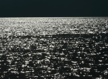 Karanlık su güneş yansımaları arka plan dokusu ile