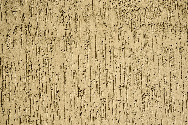 Textura de pared de yeso amarillo en forma de gotas de lluvia — Foto de Stock