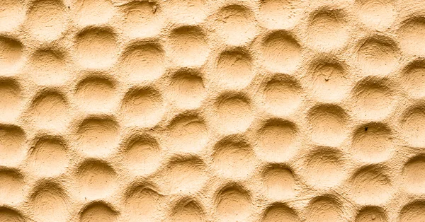 Текстура жовтих стін оштукатурених у вигляді медоносних — стокове фото