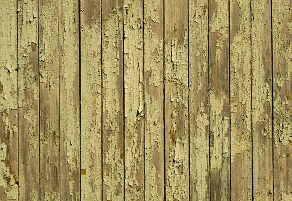 Texture of yellow old turquoise painted wooden fence — Stock Photo, Image