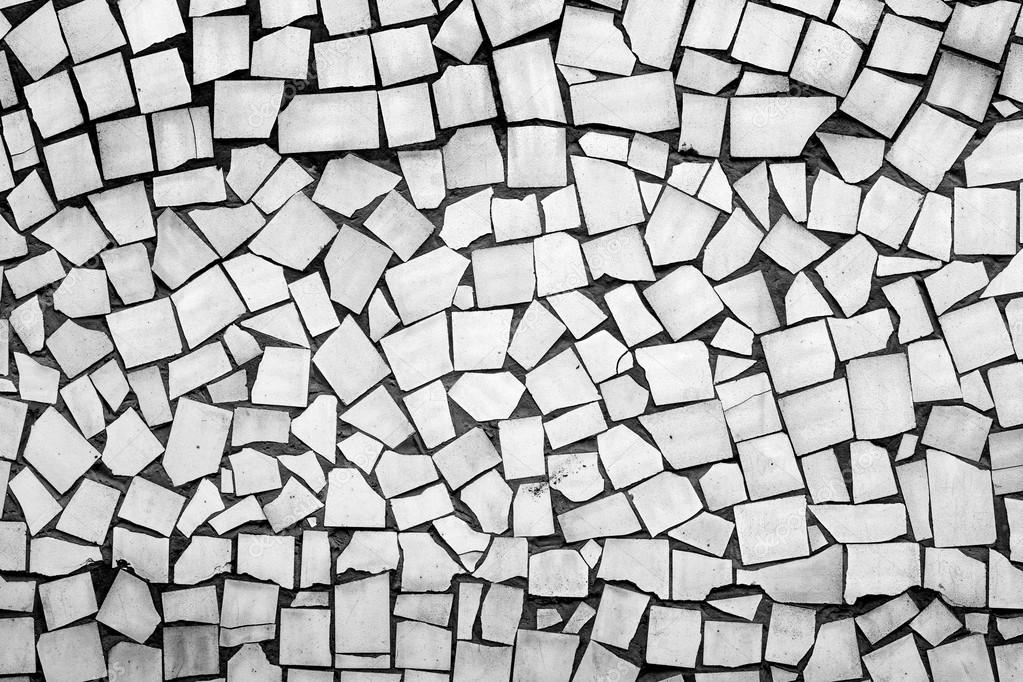 Texture of asymmetric decorative tiles black and white