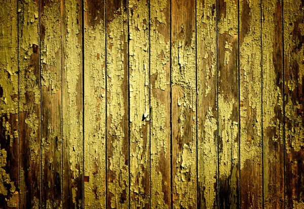 Texture of yellow old turquoise painted wooden fence high contrasted with vignetting effect — Stock Photo, Image
