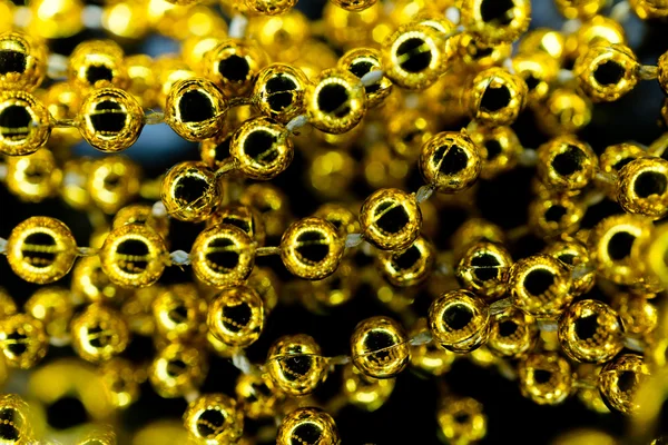 Żółte złoto naszyjnik perły makro streszczenie tło — Zdjęcie stockowe