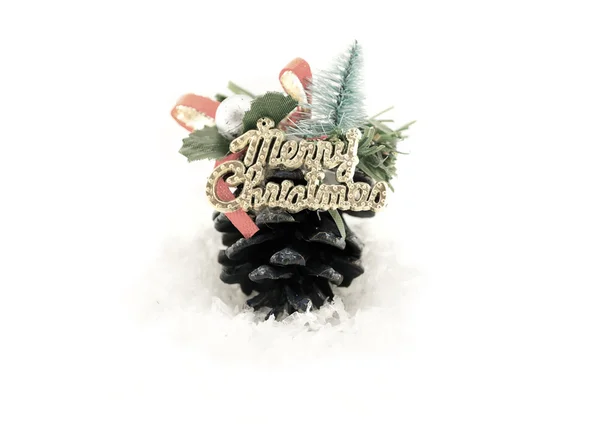 Feliz Navidad hecho a mano juguete en la nieve aislado en blanco retro filtrado — Foto de Stock
