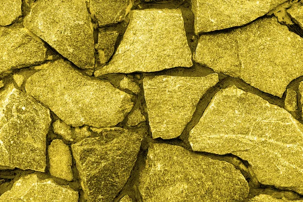 Stary złoty ściana kamienie tekstura tło — Zdjęcie stockowe
